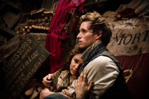 Eddie Redmayne as Marius and Samantha Barks as Eponine